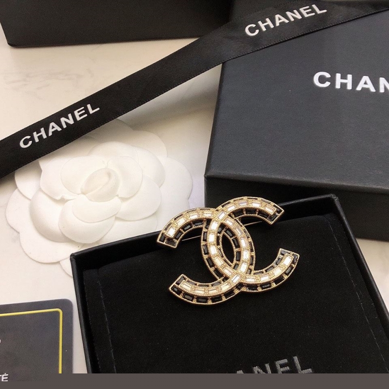 Ch*el brooches